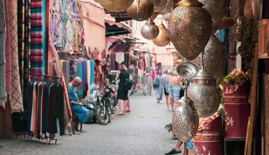 Exploring the colorful souks in Marrakech on a desert tour